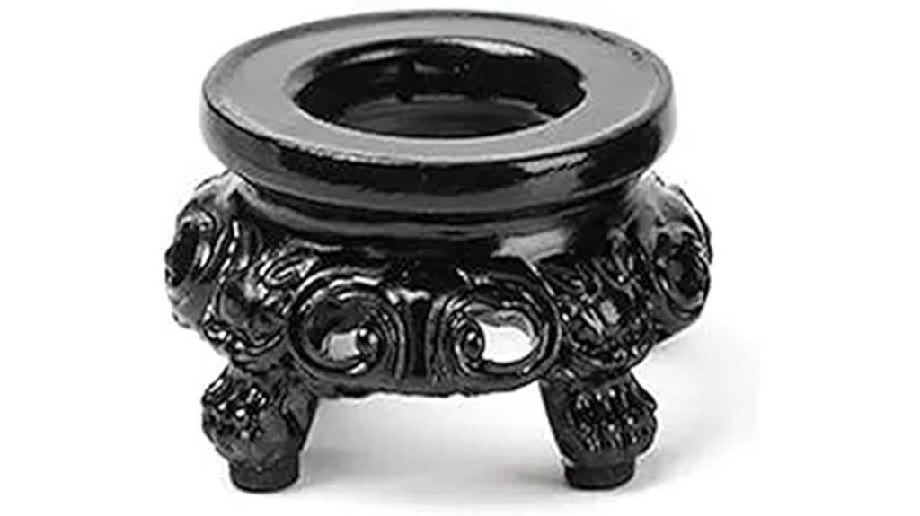 black wooden crystal sphere stand